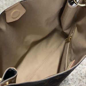 *Authentic*Used maybe 3 times and then had a baby and need a bigger purse :(